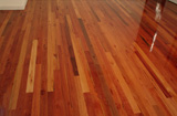 Mixed Reds strip flooring, feature grade